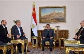 إتفاق بين مشعل وعباس على آلية اتفاق المصالحة