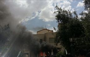 بالصور..سلفيون يحرقون مبنى لاتباع اهل البيت بالاردن