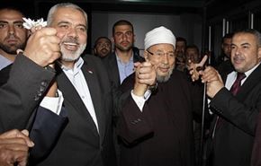 رام الله: القرضاوى يحمل جواز سفر فلسطينيا مزورا
