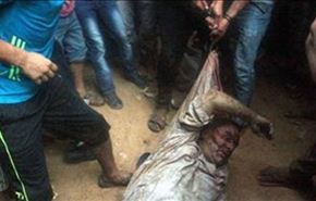 جماعات سلفية تسحل الشيخ حسن شحاته في الشارع بعد قتله