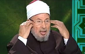 القرضاوي يفتي بوجوب تاييد مرسي واعادته للسلطة