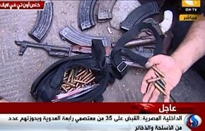 فيديو/القبض على معتصمين برابعة العدوية وبحوزتهم أسلحة