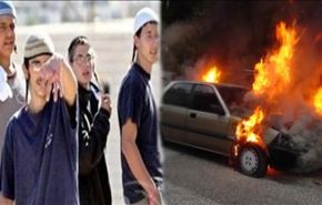 مستوطنون يحرقون سيارتين ويرسمون 