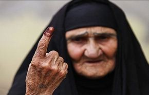 بالصور/ الجالية العراقية في إيران تصوت في الانتخابات التشريعية