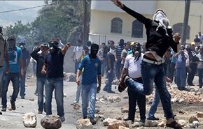 شهداء وجرحى بقلنديا اثر تفريق الاحتلال مسيرة الى القدس