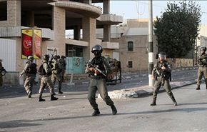 جرحى فلسطينيون خلال مواجهات مع جنود الاحتلال على حاجز قلنديا