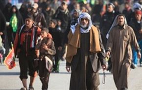 الحشد الشعبي يشارك بتنظيف طرق زوار الأربعين