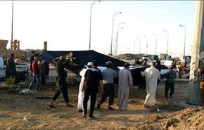 العراقيون يطيحون بأكبر راية لـ