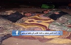 قوات الحشد الشعبي يتحملون برد الشتاء القارس لكي يدافعوا عن وطنهم