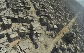 تصوير جوي للدمار الذي خلفه المسلحون في مدينة حمص