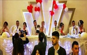 بالصور... زواج جماعي لايزديات كن اسيرات لدى 