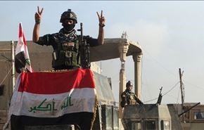 تحرير قائمقامية هيت ورفع العلم العراقي فوقها