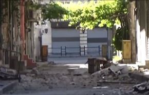 شاهد بالفيديو..الارهاب يتلذذ بدماء ضحاياه في حلب!