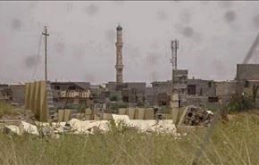 بالصور.. جندي عراقي يرفع الاذان بجامع الانبياء وسط الفلوجة