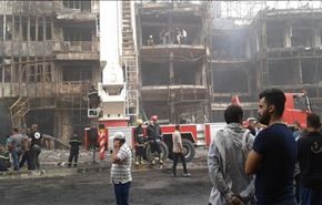 بالصور.. رفع انقاض تفجير الكرادة