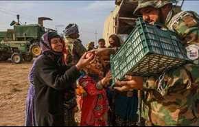 الحشد الشعبي يغيث 1200 شخصا من العوائل النازحة في تلعفر