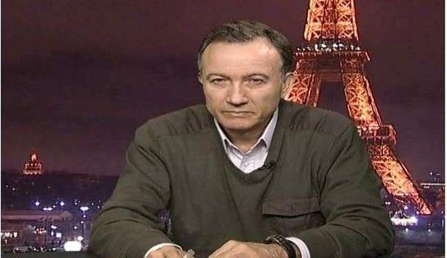 وفد سوري معارض برئاسة مناع يبحث ببغداد الحل السياسي