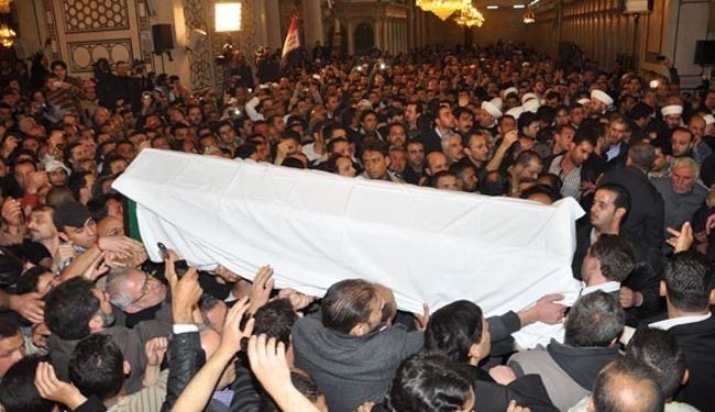بالصور...تشييع حاشد للشهيدين العلامة البوطي وحفيده