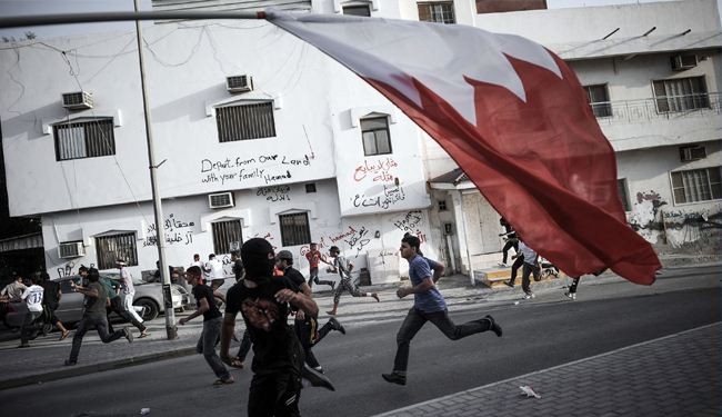 اصابة بحرينيين في قمع مسيرة تشييع الشهيد الطويل