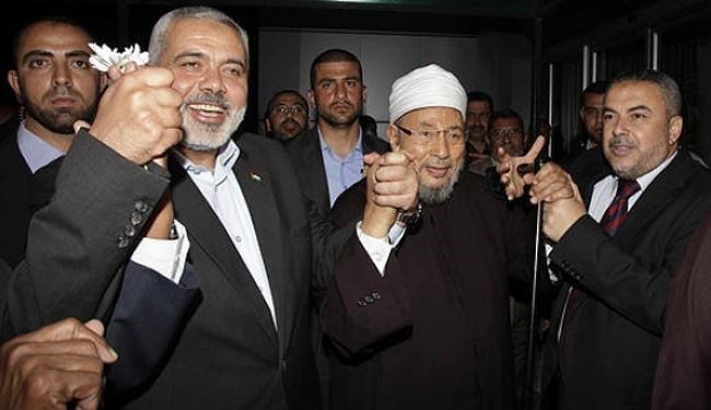 رام الله: القرضاوى يحمل جواز سفر فلسطينيا مزورا