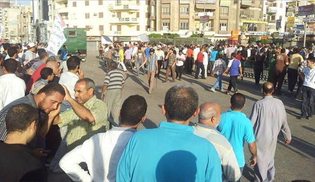 اشتباكات قبيل خطاب مرسي توقع قتيلين و185 جريحا