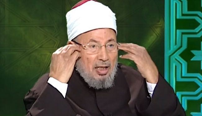 القرضاوي يفتي بوجوب تاييد مرسي واعادته للسلطة