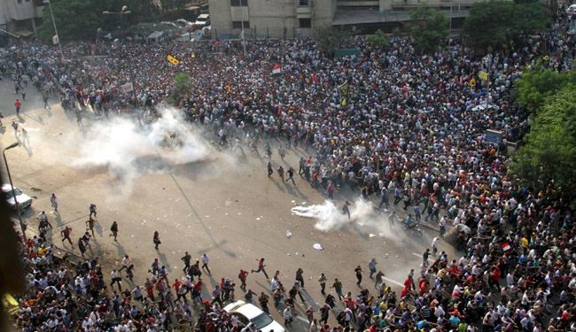 قتلى وجرحى في مصر إثر اشتباكات بين أنصار الاخوان ومعارضيهم
