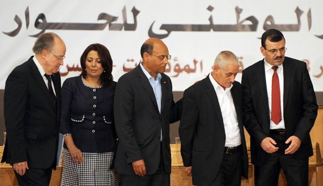 المعارضة التونسية تعلق مشاركتها في الحوار، وإحراق مقر للنهضة