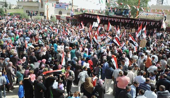 بالصور/ أهالي الغوطة الشرقية يعلنون دعمهم للجيش السوري