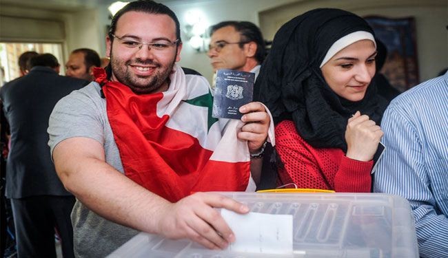 بالصور: الجالية السورية في إيران تصوت في الانتخابات الرئاسية
