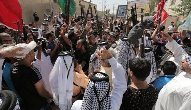 50 الف عراقي يتطوعون في سرايا المجلس الأعلى لقتال داعش+صور