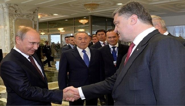 بوتين: لدينا توافق مع بوروشينكو لحل الأزمة الأوكرانية سلميا