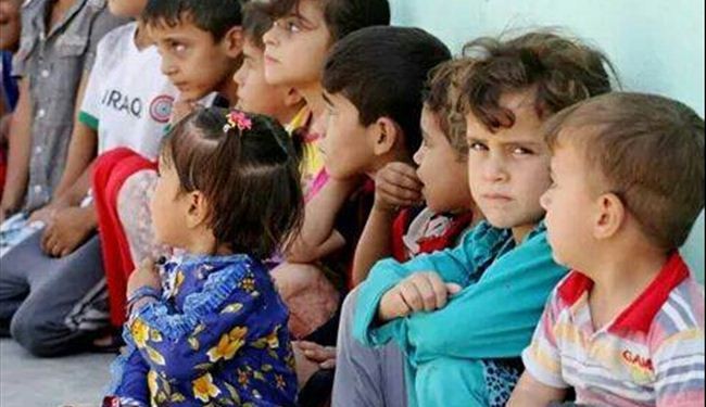 صور عن اطفال تلعفر بعد التهجير