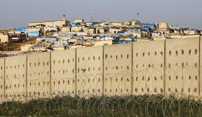 تركيا تشيد حائطا خرسانيا على الحدود مع سوريا