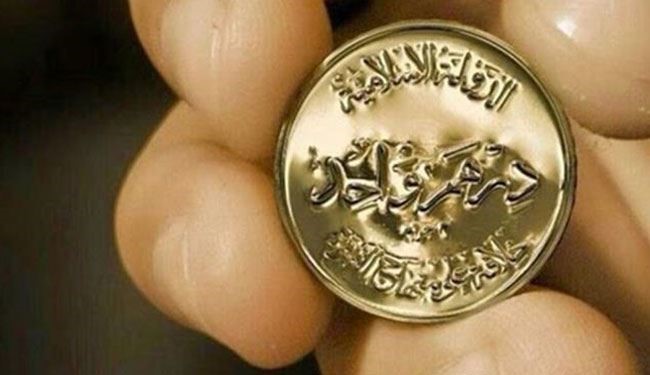 «داعش» يبدأ تداول عملته الذهبية الجديدة في الموصل+صور