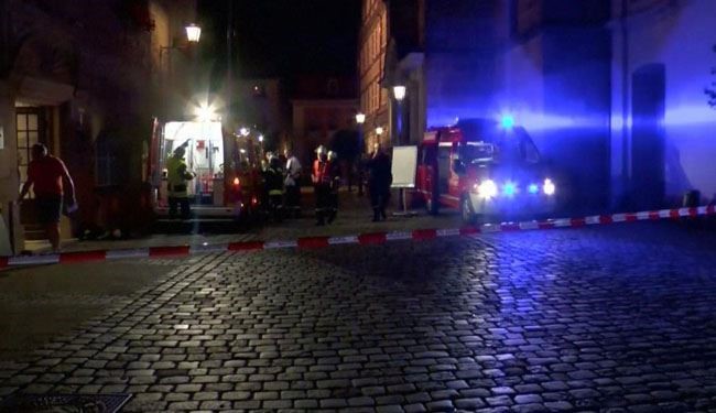 قتيل و12 جريحا بانفجار 