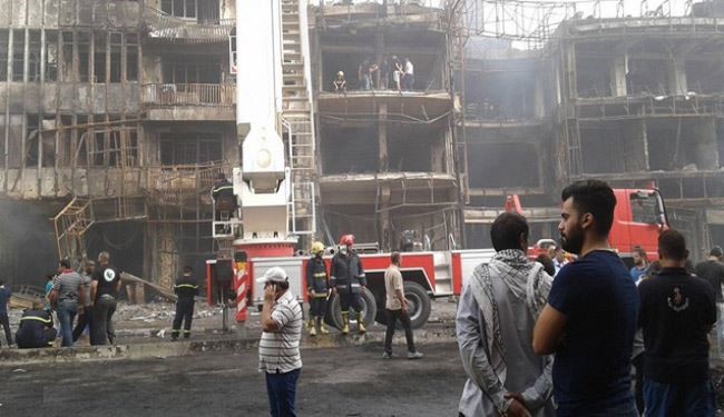 بالصور.. رفع انقاض تفجير الكرادة