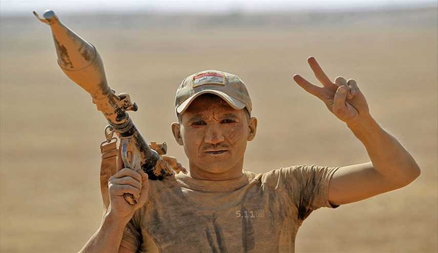 إقتحام قضاء الحمدانية ورفع العلم العراقي على مبنى المستشفى العام
