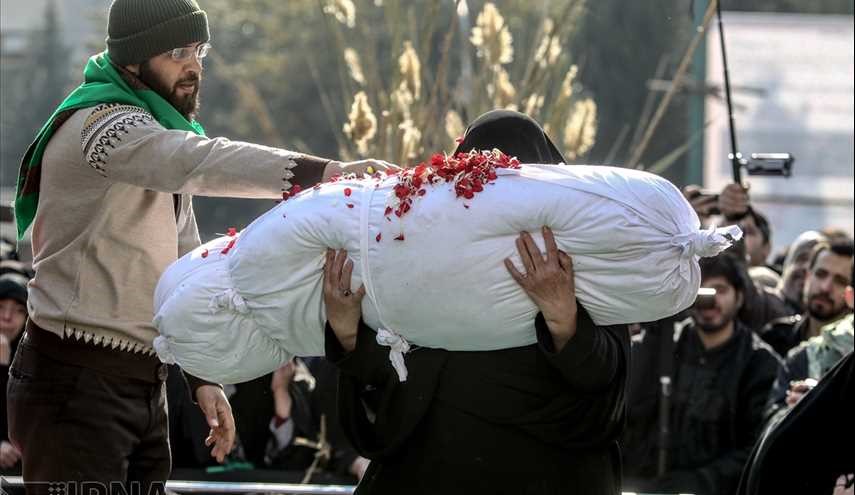 تشییع و خاکسپاری پیکر شهید گمنام در کوی دانشگاه تهران + عکس