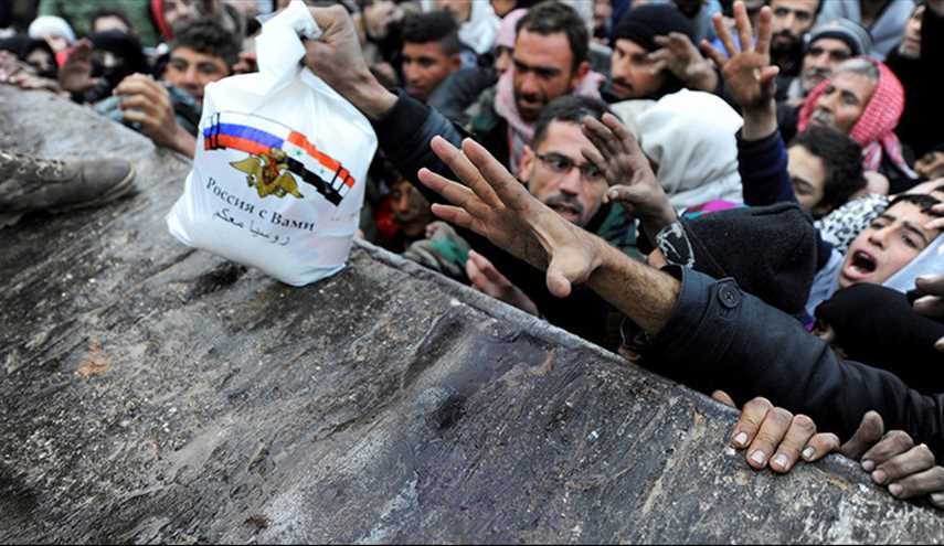مشاهد من توزيع المساعدات الإنسانية على المدنيين شرقي حلب