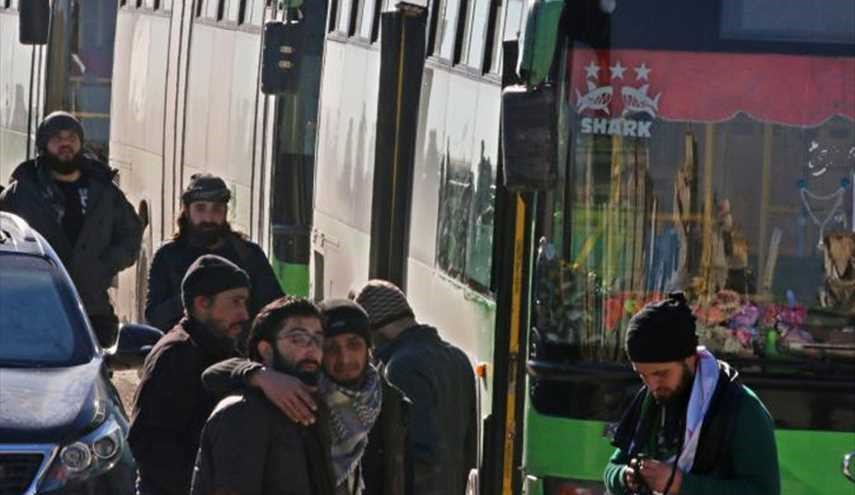 خروج الارهابيين من حلب وصور الرئيس الاسد ترافقهم