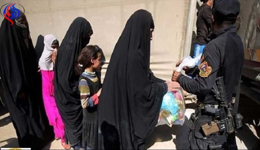 داعش يعلق شاباً ووالدته على جسر في الموصل