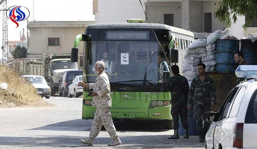 بدء وصول الباصات الى حي الوعر لنقل دفعة من المسلحين والمدنيين