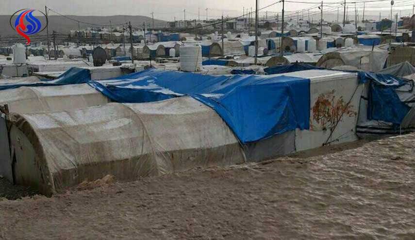 بالصور.. أمطار غزيرة تجرف مخيم بردرش للنازحين في دهوك