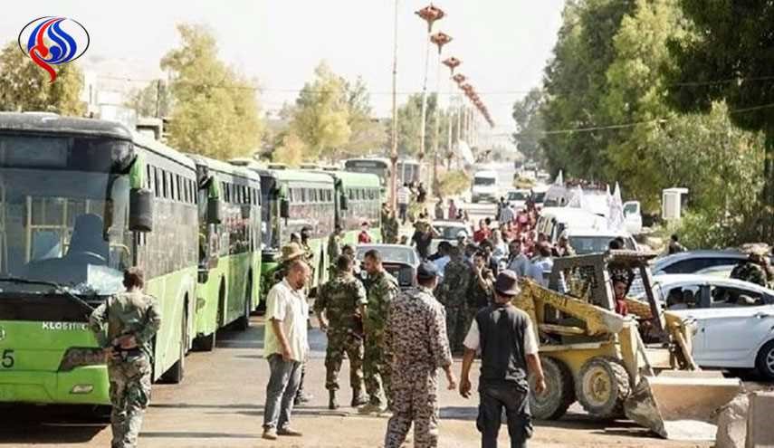 خروج الدفعة التاسعة من مسلحي حي الوعر في حمص