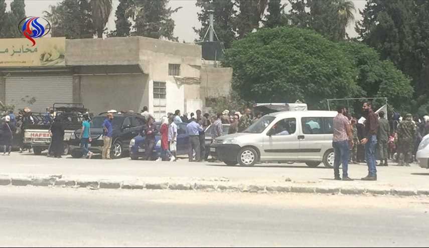 خروج عدد كبير من المسلحين مع عائلاتهم من حي القابون بدمشق