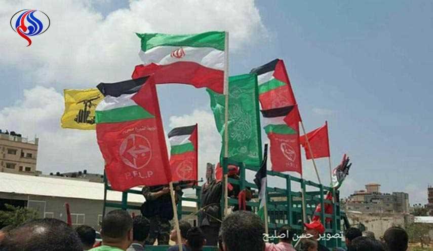 بالصور..أهالي غزة يرفعون أعلام ايران وحزب الله