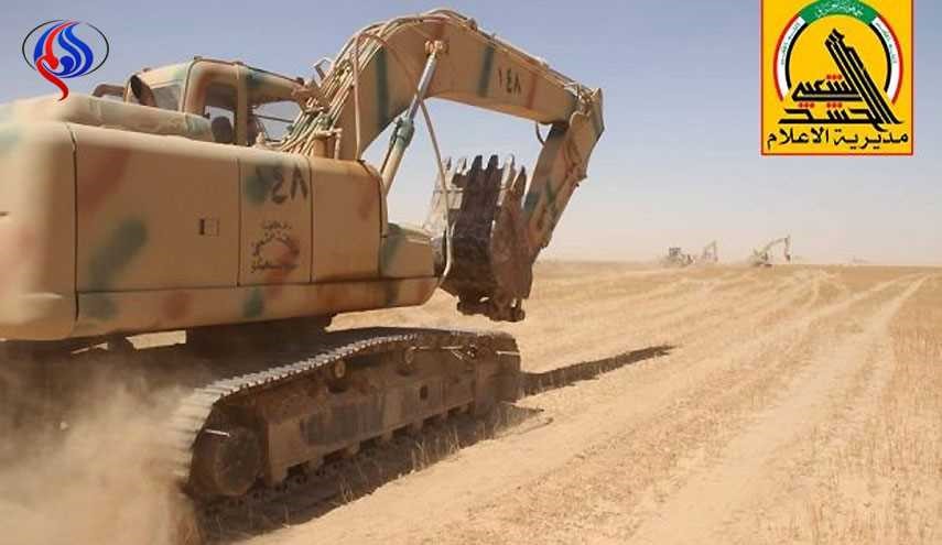 الحشد ينشأ خندقاً بطول 90 كم لتحصين الحدود العراقية السورية