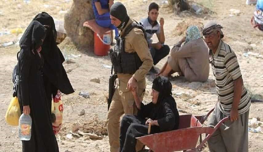 الحشد الشعبي ينقذ عشرات النازحين على الحدود العراقية السورية