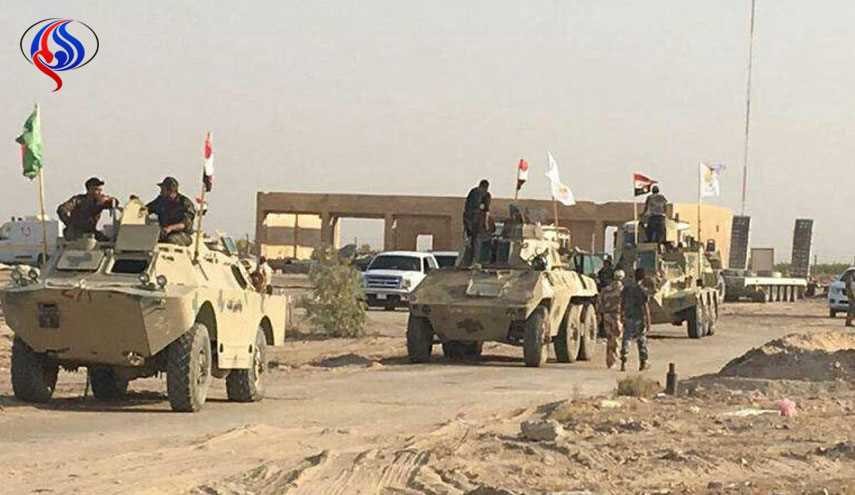 بالصور: الحشد يجري استعراضا عسكريا تمهيدا للمشاركة بتحرير تلعفر